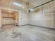 This unfinished garage features concrete flooring and open walls at 11649 E 111Th Ave, Commerce City, CO 80640