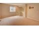 Spacious loft with carpet and a TV mount, offering flexibility and comfort at 11649 E 111Th Ave, Commerce City, CO 80640