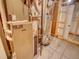 This utility room features essential mechanical equipment and a door leading to another space at 11649 E 111Th Ave, Commerce City, CO 80640