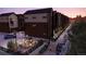 Community outdoor area with pavers and firepit for residents to enjoy at 6 Ascent Trl, Englewood, CO 80112