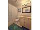 Bathroom with a shower/tub combination and updated vanity at 2218 Witter Gulch Rd, Evergreen, CO 80439