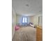 Bedroom featuring carpeted floors, a toddler bed and closet at 2218 Witter Gulch Rd, Evergreen, CO 80439