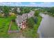 Scenic aerial view of the townhome with pond access and outdoor patio at 12668 W 1St Pl # 81, Denver, CO 80228