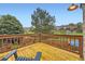 A wooden deck overlooking a green backyard at 12668 W 1St Pl # 81, Denver, CO 80228