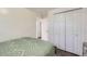 Cozy bedroom with built-in closet and carpet flooring at 12263 Clermont Ct, Thornton, CO 80241