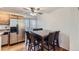 Kitchen with adjacent dining area featuring a table for four at 12263 Clermont Ct, Thornton, CO 80241