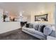 Open living area with a view into the kitchen and dining area at 12263 Clermont Ct, Thornton, CO 80241