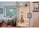 Luxurious bathroom with free standing tub, frameless shower, and leafy plants at 2013 Swede Gulch Rd, Evergreen, CO 80439