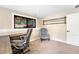 Home office featuring natural light, a desk, and a comfortable chair overlooking the property at 2013 Swede Gulch Rd, Evergreen, CO 80439