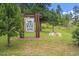 Silver Rock community sign surrounded by lush greenery at 2013 Swede Gulch Rd, Evergreen, CO 80439