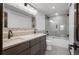 Bathroom with double vanity, large mirror, and shower/tub combo at 147 Illinois Gulch Rd # 4, Breckenridge, CO 80424