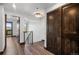 Upper floor hallway with dark wood closet doors at 147 Illinois Gulch Rd # 4, Breckenridge, CO 80424