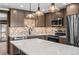 Modern kitchen with stainless steel appliances and quartz countertops at 147 Illinois Gulch Rd # 4, Breckenridge, CO 80424