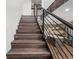 Modern staircase with LED lighting and metal railing at 147 Illinois Gulch Rd # 4, Breckenridge, CO 80424