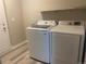 A laundry room with a washer and dryer at 9768 Mayfair St # E, Englewood, CO 80112