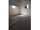 Unfinished basement space with block walls, concrete flooring, and limited natural light at 698 S 2Nd Ave, Brighton, CO 80601
