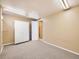 Clean and bright basement area with neutral walls and a large closet at 1490 S Iris St, Lakewood, CO 80232