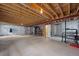 Spacious unfinished basement provides ample room for storage or customization at 8258 S Sicily Ct, Aurora, CO 80016
