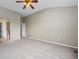 Large bedroom features a ceiling fan, an ensuite bathroom, and closet space at 8258 S Sicily Ct, Aurora, CO 80016