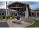 Inviting entrance to the clubhouse with stone accents and well-manicured landscaping at 8258 S Sicily Ct, Aurora, CO 80016