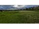 Golf course views showcasing the putting green and surrounding landscape at 8258 S Sicily Ct, Aurora, CO 80016