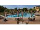 Outdoor pool with lounge chairs and tables at 8258 S Sicily Ct, Aurora, CO 80016