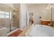 Bathroom with separate shower, and large tub at 418 Rifle Ct, Broomfield, CO 80020