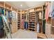 Custom walk-in closet with built in shelves and storage at 418 Rifle Ct, Broomfield, CO 80020