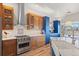 Modern kitchen showcasing stylish cabinetry, stainless steel appliances, and marble countertops at 418 Rifle Ct, Broomfield, CO 80020