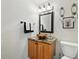 Stylish bathroom boasts a vessel sink and modern fixtures at 18590 Lower Lake Rd, Monument, CO 80132