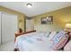 Serene bedroom featuring a plush bed and ample natural light at 18590 Lower Lake Rd, Monument, CO 80132