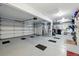 Spacious garage with multiple bays, perfect for parking and storage, featuring an organized layout at 18590 Lower Lake Rd, Monument, CO 80132