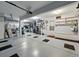 Spacious garage with ample storage racks and three garage doors at 18590 Lower Lake Rd, Monument, CO 80132