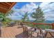 Inviting deck area offering seating with mountain views, perfect for outdoor relaxation at 10390 Hondah Dr, Littleton, CO 80127