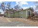 Home's backyard featuring stone steps, and low maintenance groundcover at 9551 W 38Th Ave, Wheat Ridge, CO 80033