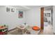 Finished basement with a table, seating, an accent rug, and natural light from a window, perfect for an art space at 9551 W 38Th Ave, Wheat Ridge, CO 80033