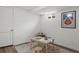 Finished basement with a desk, seating, an accent rug, and natural light from a window, perfect for an art space at 9551 W 38Th Ave, Wheat Ridge, CO 80033