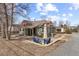 Exterior of a home with outdoor seating and a patio, perfect for enjoying the surrounding scenery at 9551 W 38Th Ave, Wheat Ridge, CO 80033