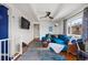 Bright living room with hardwood floors, beamed ceiling, and ample seating at 9551 W 38Th Ave, Wheat Ridge, CO 80033