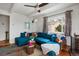 Living room with a plush sectional sofa, modern decor, and natural light at 9551 W 38Th Ave, Wheat Ridge, CO 80033