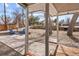 Covered porch featuring cozy seating area and stone patio at 9551 W 38Th Ave, Wheat Ridge, CO 80033