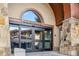 Welcoming stone entrance to the Chateaux building with automatic doors, great location and amenities at 405 Village Rd # 405, Breckenridge, CO 80424