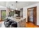 Open kitchen featuring granite counters, pendant lighting, modern appliances, and bar stool seating at 405 Village Rd # 405, Breckenridge, CO 80424