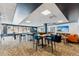 Stylish lounge area with comfortable seating, tables, and entertainment options for relaxation at 405 Village Rd # 405, Breckenridge, CO 80424