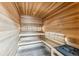 Relaxing sauna with wooden benches and heater, perfect for unwinding after a long day at 405 Village Rd # 405, Breckenridge, CO 80424