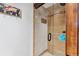 Tiled shower with glass door and wooden trim, offering a spa-like experience at 405 Village Rd # 405, Breckenridge, CO 80424