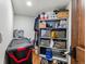Organized storage closet with shelves and bins, providing ample space for belongings and gear at 405 Village Rd # 405, Breckenridge, CO 80424