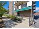 Inviting entrance to 'The Cameo' apartment building, showcasing well-maintained landscaping at 1265 Elizabeth St # 305, Denver, CO 80206