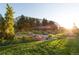 Lush gardens featuring vibrant flowers, green grass, benches, and architectural structures, creating a serene outdoor escape at 1265 Elizabeth St # 305, Denver, CO 80206