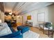 Inviting open living space, featuring hardwood floors and modern accents at 1265 Elizabeth St # 305, Denver, CO 80206